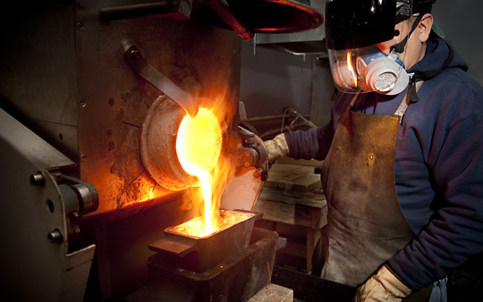 Gold being poured from induction furnace